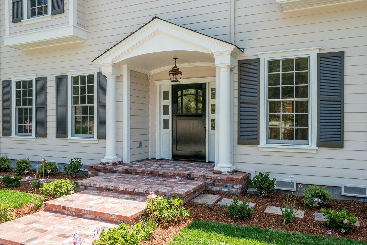 Move-in ready home in Belmont with landscaped front entry by Nejasmich Developments